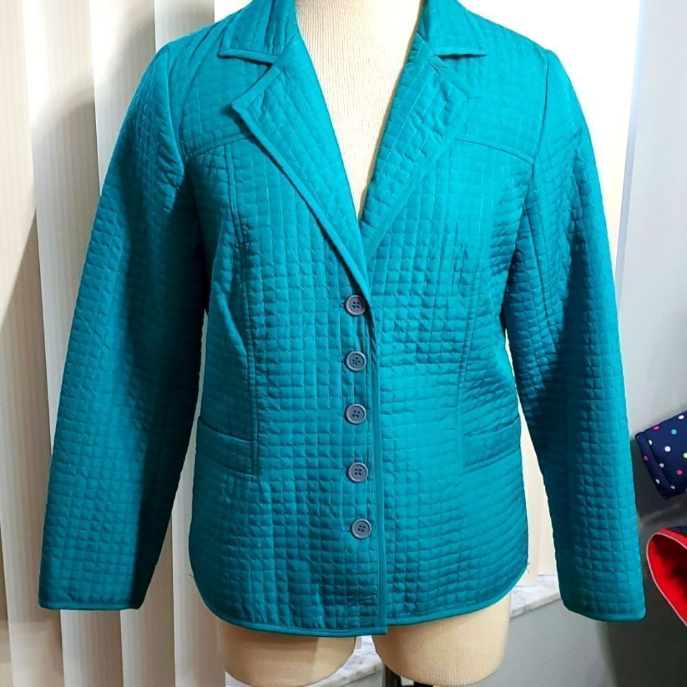 Requirements, tourqwise/green quilted jacket. Size small. Pockets.